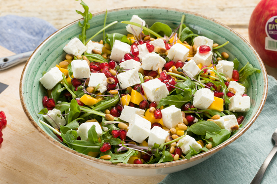 Pomegranate salad with mango and rocket